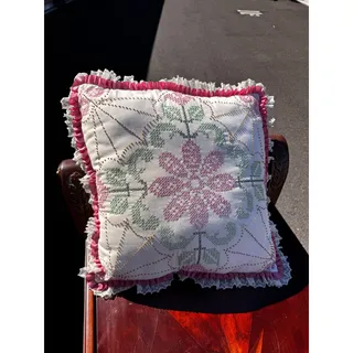 Photo of vintage pink green floral cross-stitch needlepoint pillow pink lace ruffled trim