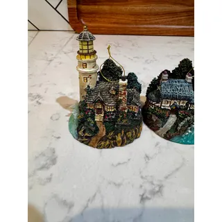 Photo of Thomas Kinkade Lighthouse Collection miniature illuminated lighthouse ornaments