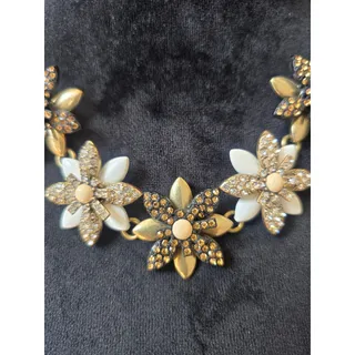 Photo of Gold Tone Ivory Floral Rhinestone Statement Necklace