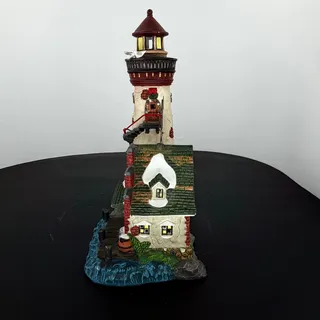 Photo of Santa's Workbench Lighthouse with Keeper House Lighted Christmas Village Coastal Decor Gift for Collector Nautical Holiday Mantel