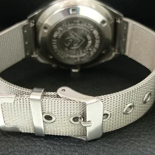 Photo of Vintage 1976 Ricoh Automatic Mens Silver Watch W/daydate & Red accents