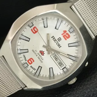 Photo of Vintage 1976 Ricoh Automatic Mens Silver Watch W/daydate & Red accents