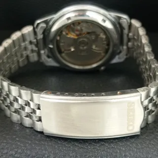 Photo of Vintage 1981 Seiko Automatic Mens Silver Watch W/daydate & Red accents