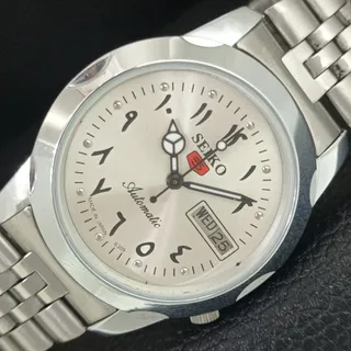 Photo of Vintage 1981 Seiko Automatic Mens Silver Watch W/daydate & Red accents