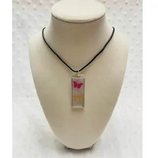 Photo of  Silver Outlined Clear Enameled Resin Butterfly Pendant w/Braided Leather Cord