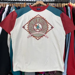 Photo of Vintage 90s Jansport Tropical Sun International Beach Apparel T-Shirt