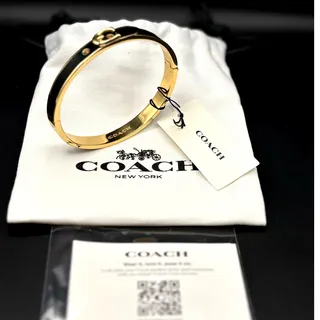 Photo of Coach 408104GLD001 Thin Enamel Signature Push Hinged Bangle Gold/Black NWT