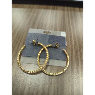 Photo of Gold hoop earrings with white rhinestones 
